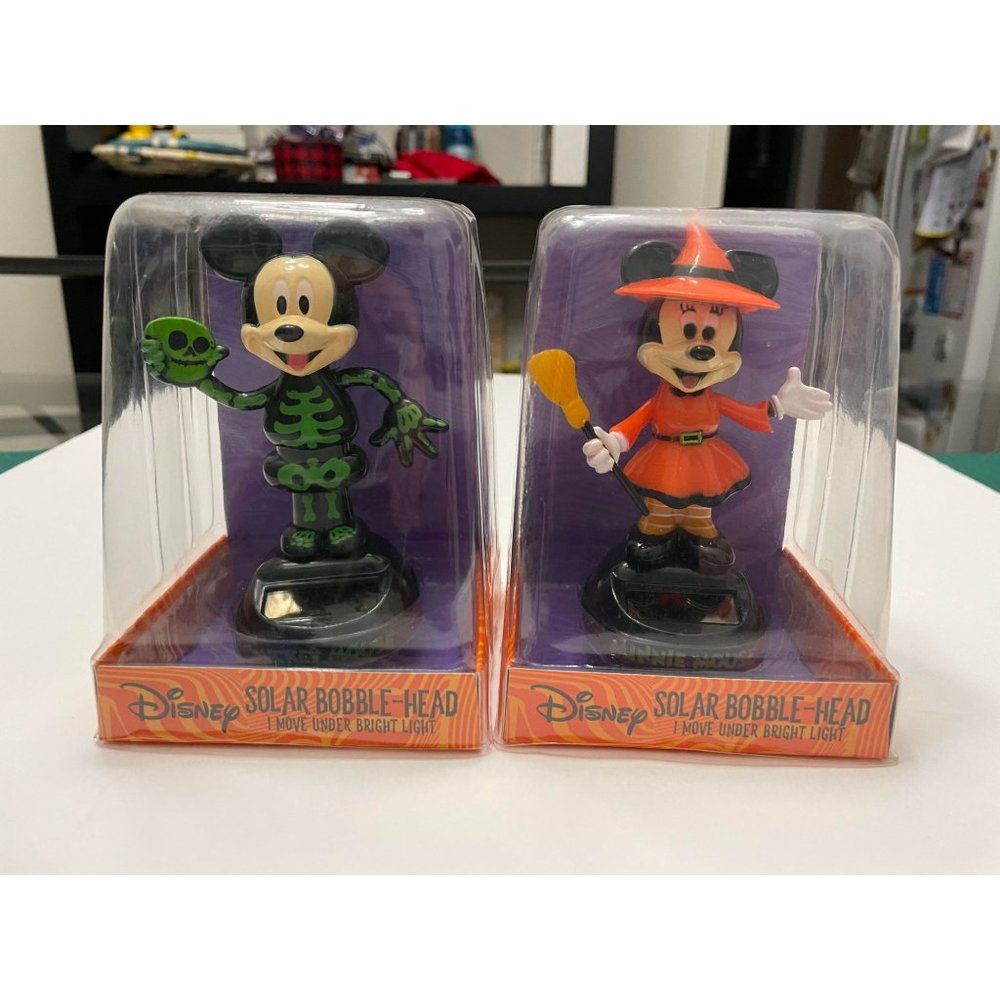 NIB- Disney Mickey and Minnie Solar Bobbleheads